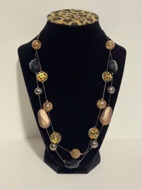 Multi-strand Necklace Featuring a Mix of Black, Gold and Leopard Beads
